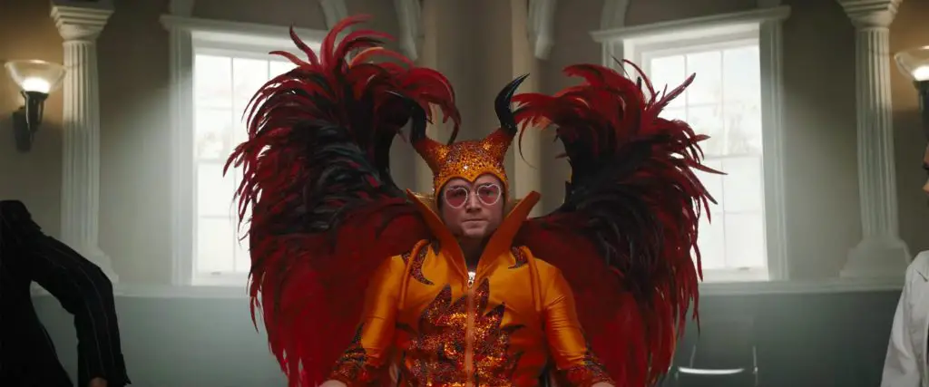 Elton In Devil Outfit