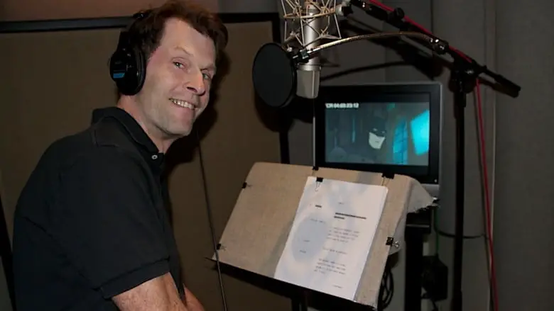 Kevin Conroy in the studio voicing Batman