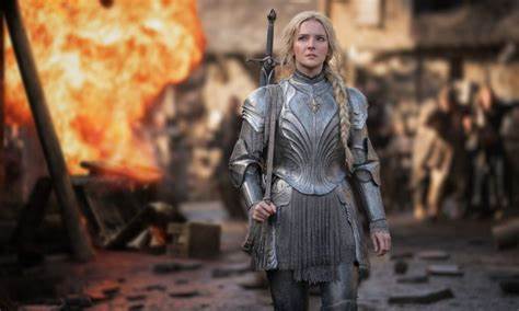 The Rings of Power - Morfydd Clark as Galadriel in armor with a sword strapped to her back